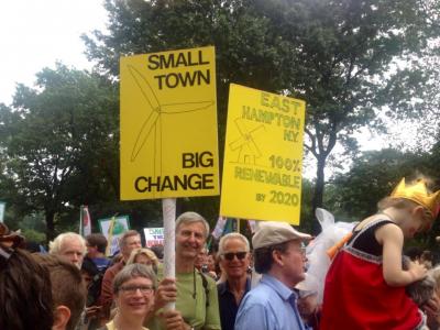 Gordian Raacke, center, of Renewable Energy Long Island, held a sign touting East Hampton Town's commitment to getting all its energy from renewable sources by 2020. Gordian Raacke, center, of Renewable Energy Long Island, held a sign touting East Hampton Town's commitment to getting all its energy from renewable sources by 2020.