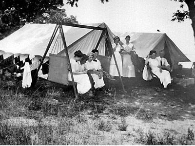 Edith Banister Huntting, third from right, and her fellow campers on Three Mile Harbor in 1910. Edith Banister Huntting, third from right, and her fellow campers on Three Mile Harbor in 1910.