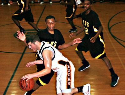 East Rockaway’s thick-chested guards, who handled the ball very well, posed problems. East Rockaway’s thick-chested guards, who handled the ball very well, posed problems.