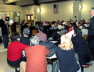 Raymond Fell, a superintendent search consultant, conducted a community forum at East Hampton High School on Tuesday, attended by a mixed bag of staff, parents, and East Hampton taxpayers.