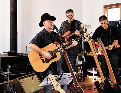 Mick Hargreaves practiced in his studio with members of his band, the King Guys, last weekend. Mick Hargreaves practiced in his studio with members of his band, the King Guys, last weekend.