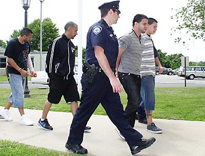 After a night of alleged brawling in Montauk, these four men were led into East Hampton Town Court Monday afternoon, three of them charged with inciting a riot. After a night of alleged brawling in Montauk, these four men were led into East Hampton Town Court Monday afternoon, three of them charged with inciting a riot.