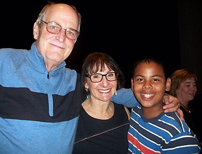 Laura Anker Grossman stepped down from the East Hampton School Board on Tuesday night after 20 years. Her husband, Stephen Grossman, and grandson, Mizel Faison, attended the meeting.