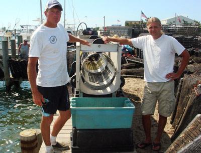 Mike Martinsen, left, and Mike Doall, are the “two Mikes” behind the Montauk Shellfish Company’s oyster farm in Lake Montauk. Mike Martinsen, left, and Mike Doall, are the “two Mikes” behind the Montauk Shellfish Company’s oyster farm in Lake Montauk.
