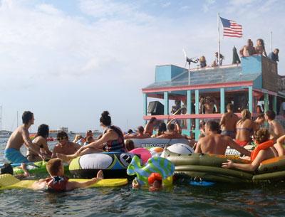 Revelers surrounded a floating stage at an annual boat party Sunday afternoon near Sag Harbor. Revelers surrounded a floating stage at an annual boat party Sunday afternoon near Sag Harbor.