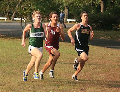 Bracketed by Westhampton Beach’s Graham Brown and Sayville’s Kiernan Harrison, Adam Cebulski headed for the finish. Bracketed by Westhampton Beach’s Graham Brown and Sayville’s Kiernan Harrison, Adam Cebulski headed for the finish.