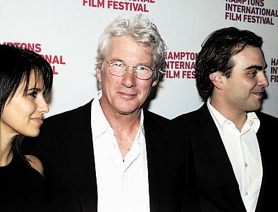 Richard Gere, center, with Hilaria Baldwin and Andrew Finkelstein outside Guild Hall on Saturday night. Richard Gere, center, with Hilaria Baldwin and Andrew Finkelstein outside Guild Hall on Saturday night.