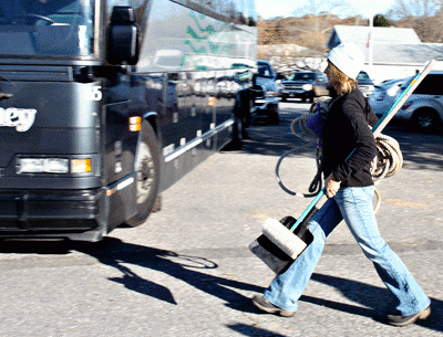 A volunteer helped load a Hampton Jitney with supplies for a trip to Breezy Point Tuesday to help in cleanup efforts. A volunteer helped load a Hampton Jitney with supplies for a trip to Breezy Point Tuesday to help in cleanup efforts.