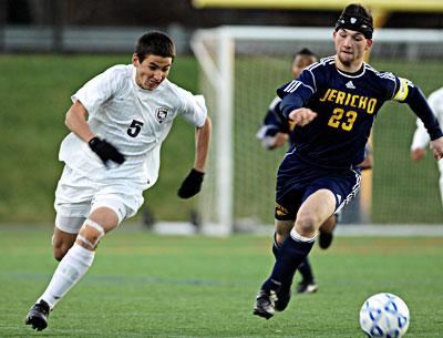 Nick West (5), who led East Hampton in scoring in the postseason, and his teammates were held in check by the Jayhawks. Nick West (5), who led East Hampton in scoring in the postseason, and his teammates were held in check by the Jayhawks.