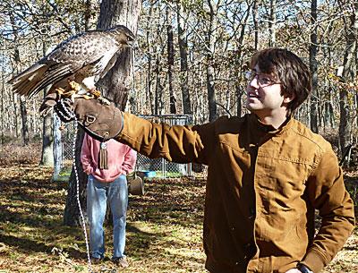 Sam Kramer, a senior at the Ross School, began training his red-tailed hawk two weeks ago as a senior project that sprang from a longtime interest in falconry. Sam Kramer, a senior at the Ross School, began training his red-tailed hawk two weeks ago as a senior project that sprang from a longtime interest in falconry.