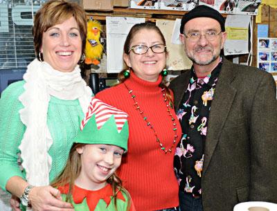 One Stop Pet Shop in Amagansett held its annual Santa Paws event on Sunday. Pictured from left are the shop’s Suzanne Bye, Haleigh, her daughter, Lisa Narizzano, and Mario Orlando. One Stop Pet Shop in Amagansett held its annual Santa Paws event on Sunday. Pictured from left are the shop’s Suzanne Bye, Haleigh, her daughter, Lisa Narizzano, and Mario Orlando.