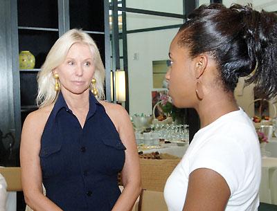 Courtney Ross, left, the founder of the Ross School in East Hampton, spoke with a student there in 2006. She has annouced to a group of teachers and administrators that she intends to cruise the world on a yacht.