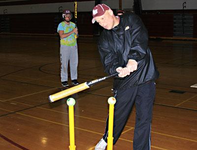 Lou Reale, East Hampton’s softball coach, showed how it’s done when you’re told to “take two and hit to right.”