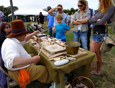 At the well-attended Montauk Archaeology Festival on Saturday, Arthur Kirmss showed a small group a display of wampum and other relics. At the well-attended Montauk Archaeology Festival on Saturday, Arthur Kirmss showed a small group a display of wampum and other relics.