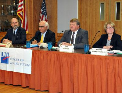 Four candidates for East Hampton Town Board, from left, Job Potter, Councilman Dominick Stanzione, Town Clerk Fred Overton, and Kathee Burke-Gonzalez, talked through the issues Monday night in East Hampton. Four candidates for East Hampton Town Board, from left, Job Potter, Councilman Dominick Stanzione, Town Clerk Fred Overton, and Kathee Burke-Gonzalez, talked through the issues Monday night in East Hampton.