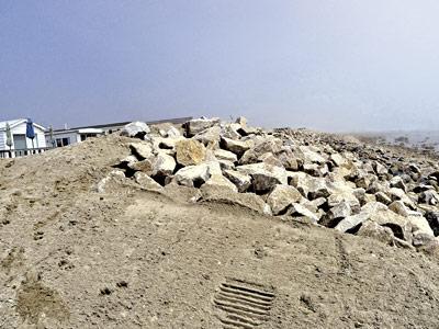 Settlement negotiations are underway between the Department of Environmental Conservation and Montauk Shores Condominiums over a rock revetment the state said was improperly installed last year. Settlement negotiations are underway between the Department of Environmental Conservation and Montauk Shores Condominiums over a rock revetment the state said was improperly installed last year.
