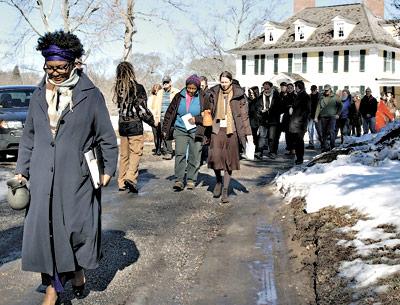 Sandra Arnold led the singing of spirituals during a “walk of remembrance” to the slave burial ground at Sylvester Manor on Saturday morning. She was among those who spoke following a screening of “Traces of the Trade: A Story From the Deep North” at the Shelter Island Library the previous night. Sandra Arnold led the singing of spirituals during a “walk of remembrance” to the slave burial ground at Sylvester Manor on Saturday morning. She was among those who spoke following a screening of “Traces of the Trade: A Story From the Deep North” at the Shelter Island Library the previous night.