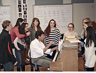 David Douglas, the director of the East Hampton High School Camerata singing group, rehearsed with its members this week in advance of a trip to Rome in April.
