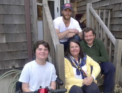 The Lightcap family, Terence Lightcap (in chair) Grace, Ed, and Dustin (on stairs) will hold a yard sale on Memorial Day weekend to raise money for research into drugs that could help Terence, who has Duchenne muscular dystrophy. The Lightcap family, Terence Lightcap (in chair) Grace, Ed, and Dustin (on stairs) will hold a yard sale on Memorial Day weekend to raise money for research into drugs that could help Terence, who has Duchenne muscular dystrophy.