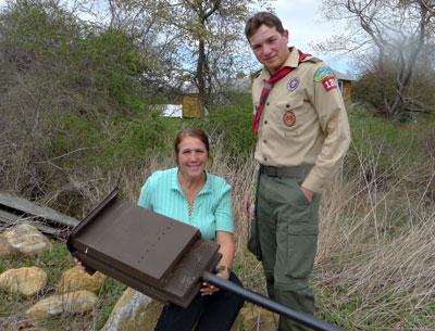 With the help of his fellow Boy Scouts in Troop 136, Richard Malik Atkinson completed the last stage of his Eagle Scout qualifications by building 20 bat houses like the one held by his mother, Dorothy Malik Atkinson. With the help of his fellow Boy Scouts in Troop 136, Richard Malik Atkinson completed the last stage of his Eagle Scout qualifications by building 20 bat houses like the one held by his mother, Dorothy Malik Atkinson.