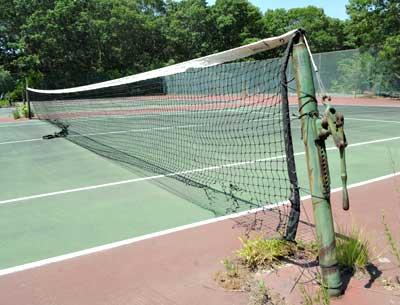 East Hampton Town is reviving plans for affordable condos at this former tennis court site on Accabonac Road in East Hampton. East Hampton Town is reviving plans for affordable condos at this former tennis court site on Accabonac Road in East Hampton.