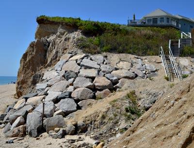 John Ryan, who already has one rock revetment on his property, is asking for a second one facing the ocean beach. John Ryan, who already has one rock revetment on his property, is asking for a second one facing the ocean beach.