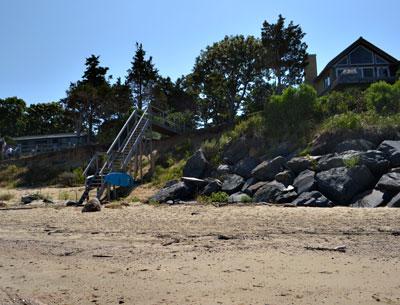 The East Hampton Town Trustees have denied a permit application for a rock revetment spanning four properties off Louse Point Road in Springs. The East Hampton Town Trustees have denied a permit application for a rock revetment spanning four properties off Louse Point Road in Springs.