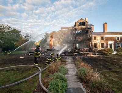A centuries-old house in Sagaponack may have to be demolished after a fire razed one wing of the house at 850 Sagg main Street and severly damaged the other Monday morning. A centuries-old house in Sagaponack may have to be demolished after a fire razed one wing of the house at 850 Sagg main Street and severly damaged the other Monday morning.