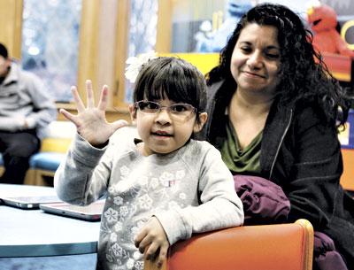 During a visit to the East Hampton Library with her mother, Antonia Alvarez, Madison Alvarez proudly shared her age following a recent birthday.