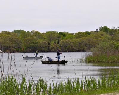 Fishermen plied the waters of Fort Pond in Montauk last month. Fishermen plied the waters of Fort Pond in Montauk last month.