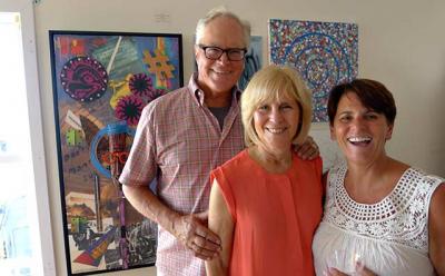 Tom Griffin, a board member, and his wife, Helene Griffin, with Lisa DeVeglio, the president of the Montauk Playhouse Community Center Foundation, at the opening reception Saturday for a pop-up art gallery to benefit the Playhouse. Tom Griffin, a board member, and his wife, Helene Griffin, with Lisa DeVeglio, the president of the Montauk Playhouse Community Center Foundation, at the opening reception Saturday for a pop-up art gallery to benefit the Playhouse.