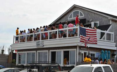 In a lawsuit against East Hampton Town and one of its fire marshals, Drew Doscher, an owner of the Sloppy Tuna in Montauk, above, claimed a deliberate campaign against the club took place in 2012.