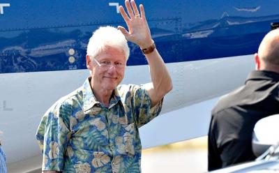 Bill Clinton arrived at East Hampton Airport on Sunday. Hillary Rodham Clinton was expected in town on tomorrow. Bill Clinton arrived at East Hampton Airport on Sunday. Hillary Rodham Clinton was expected in town on tomorrow.