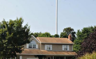 Tower looms over homes to the North East of Springs Firehouse. Tower looms over homes to the North East of Springs Firehouse.