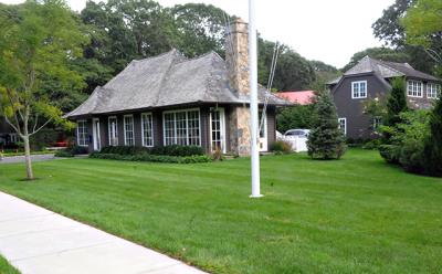 Michael Davis, a builder, hopes East Hampton Town will allow him to merge two nonconforming properties east of his Wainscott office. Michael Davis, a builder, hopes East Hampton Town will allow him to merge two nonconforming properties east of his Wainscott office.