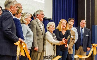 With elected officials and the Amagansett school district’s board on hand, Eleanor Tritt, the superintendent, and Victoria Handy, the board’s president, cut a ribbon to welcome the original Amagansett schoolhouse to the grounds of the present school.