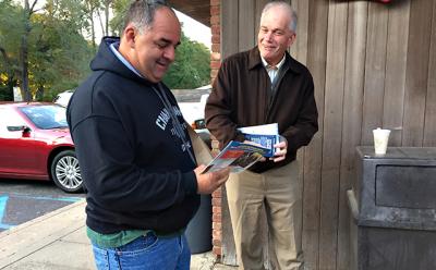 Tom Knobel, right, the Republican candidate for East Hampton Town supervisor, spent Tuesday morning handing out his campaign literature. Tom Knobel, right, the Republican candidate for East Hampton Town supervisor, spent Tuesday morning handing out his campaign literature.