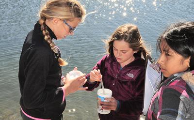 From left, Jameson Grant, Devyn Eames, and Milena Torres worked together to measure various aspects of water quality at Louse Point on Oct. 23 as part of the Day in the Life of the Peconic Estuary program. From left, Jameson Grant, Devyn Eames, and Milena Torres worked together to measure various aspects of water quality at Louse Point on Oct. 23 as part of the Day in the Life of the Peconic Estuary program.