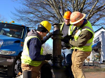 Workers on Newtown Lane, East Hampton, yesterday, part of a water authority project that will continue into the spring. Workers on Newtown Lane, East Hampton, yesterday, part of a water authority project that will continue into the spring.