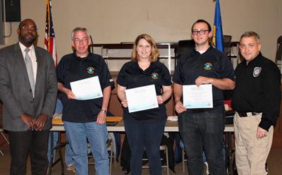 An ambulance crew from Sag Harbor were honored at a recent meeting of the Suffolk County Regional Emergency Medical Services Council. From left, Dr. Gregson Pigott, the E.M.S. medical director, with Joel Vetter, far right, helped honor the Sag Harbor volunteers, that included Eddie Downes, Denise Schoen, and Mike Stone. An ambulance crew from Sag Harbor were honored at a recent meeting of the Suffolk County Regional Emergency Medical Services Council. From left, Dr. Gregson Pigott, the E.M.S. medical director, with Joel Vetter, far right, helped honor the Sag Harbor volunteers, that included Eddie Downes, Denise Schoen, and Mike Stone.