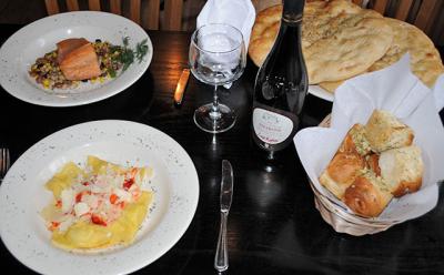 Signature garlic rolls and focaccia complement meals at Cappelletti in Noyac. Signature garlic rolls and focaccia complement meals at Cappelletti in Noyac.
