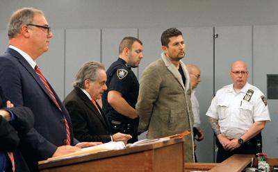 Sean P. Ludwick, fourth from left, was ordered held without bail on Tuesday. Sean P. Ludwick, fourth from left, was ordered held without bail on Tuesday.