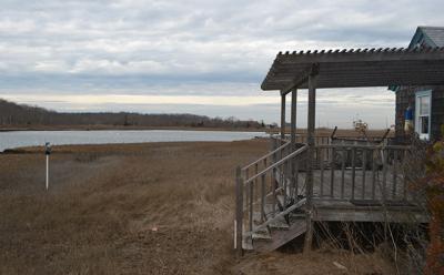 Neighbors of a Gerard Drive cottage have said that a planned house there would be the environmentally sensitive Springs peninsula’s “first McMansion.” Neighbors of a Gerard Drive cottage have said that a planned house there would be the environmentally sensitive Springs peninsula’s “first McMansion.”