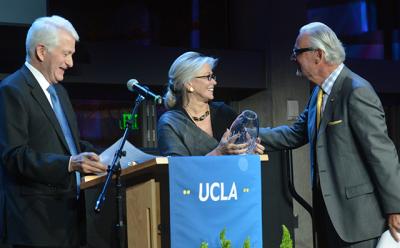 Courtney Sale Ross, the founder of the Ross School in East Hampton, was presented with a Global Citizen Award from the University of California at Los Angeles on Feb. 8 by Gene Block, left, the university’s chancellor, and Marcelo Suarez-Orozco, U.C.L.A.’s dean of education and information studies.