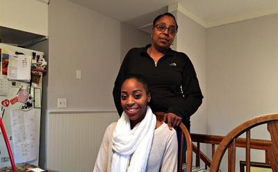 Janae Jones, seated, underwent a surgery four years ago that was financed in part by the Island Gift of Life Foundation. She and her mother, Samone Johnson, standing, say the surgery was life-changing. Janae Jones, seated, underwent a surgery four years ago that was financed in part by the Island Gift of Life Foundation. She and her mother, Samone Johnson, standing, say the surgery was life-changing.