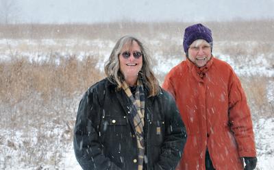 Neither snow, nor rain, nor anything else will keep Dai Dayton, left, and Sandra Ferguson of the Friends of the Long Pond Greenbelt from enjoying the open space they have worked to protect.