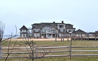 Michael and Michelle Walrath, the owners of this West Lake Drive house in Montauk, are appealing to the town to be allowed to use a third floor that is already built. Michael and Michelle Walrath, the owners of this West Lake Drive house in Montauk, are appealing to the town to be allowed to use a third floor that is already built.