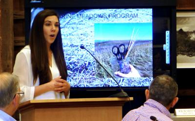 Kimberly Barbour of Cornell Cooperative Extension’s marine program told the East Hampton Town Trustees on Monday of plans to restore waterways with native grasses and shellfish. Kimberly Barbour of Cornell Cooperative Extension’s marine program told the East Hampton Town Trustees on Monday of plans to restore waterways with native grasses and shellfish.