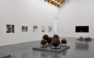 An installation view of the Brian Gaman exhibition at the Parrish Art Museum includes several of his pigment prints and two groupings of his sculptures. An installation view of the Brian Gaman exhibition at the Parrish Art Museum includes several of his pigment prints and two groupings of his sculptures.