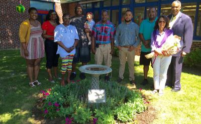 Family members and friends of Helen Hayes and Queen Davis Parks, two late employees of the John M. Marshall Elementary School, gathered in the school’s new outdoor science classroom, which was dedicated in honor of Ms. Hayes and Ms. Parks. From left are Bonnie Hayes, Azaria Parks, Amanda Hayes, Dudley Hayes with his granddaughter Jayla Hayes, Jamalia Hayes, Blake Parks, Anthony Hayes, Olivia Brooks, and Leon Parks.